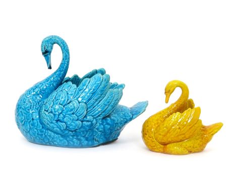 A Burmantofts Faience Swan table centrepiece, covered in a turquoise glaze, and another swan model no.736, smaller covered in