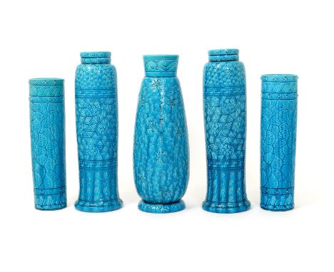 A garniture of five Burmantofts Faience Grass vases, model no.1659, 1397 and 1398, modelled in low relief and glazed in turqu