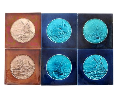 A rare set of three Burmantofts Faience tiles by Harold Leach , modelled in low relief with a vignette to the centre, glazed 