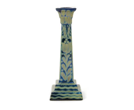 A Burmantofts Faience lustre candlestick by Joseph Walmsley, stepped square base supporting tapering square section column, p