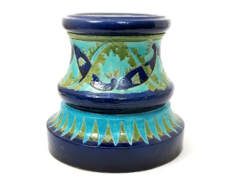 A Burmantofts Faience Partie-Colour jardiniere stand, model no.2156, waisted cylindrical form, decorated in low relief with a
