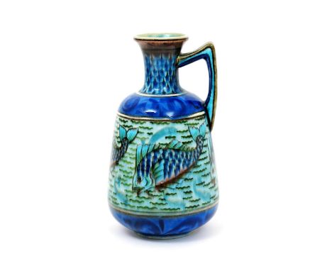 A Burmantofts Faience Anglo-Persian single handled vase by Leonard King, model no.D221, painted with a frieze of scaly fish s