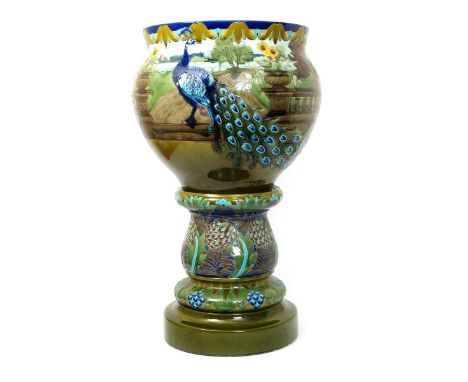 A large Burmantofts Faience Partie-Colour  jardiniere and stand, model no.2115-2116, the ovoid bowl decorated in low relief w