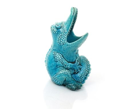 A Burmantofts Faience grotesque model of a crocodile, model no.1898, modelled seated with gaping jaws, covered in a turquoise