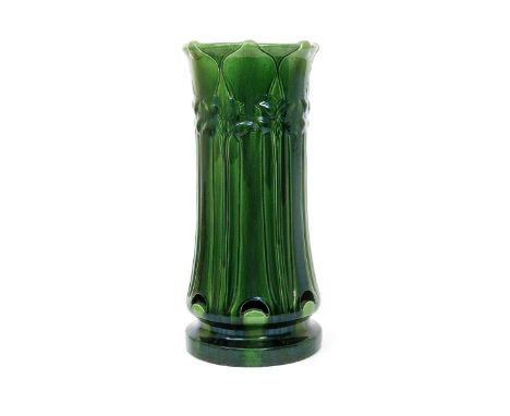 A Burmantofts Faience Pottery Secessionist stick-stand, model no.2211, pierced, cylindrical form, cast in low relief with fol