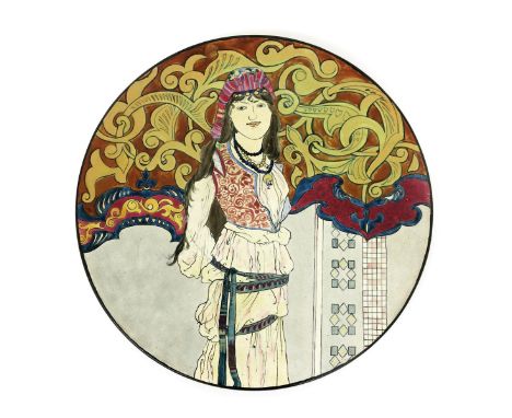 A Burmantofts Faience charger by William Neatby, dated 1887, painted with a dancer in exotic eastern costume, before Art Nouv