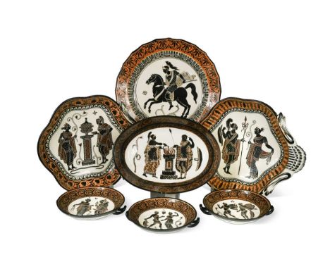 A Giustiniani of Naples terracotta part dessert service, comprising two oval dishes, three plates, two shell handled dishes a