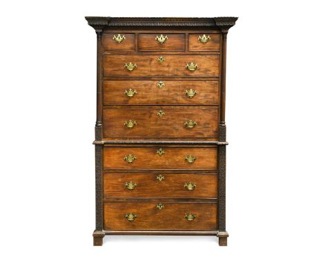 A George II mahogany chest on chest in the Chippendale manner,  the moulded cornice decorated with ruffled leaf and flower he