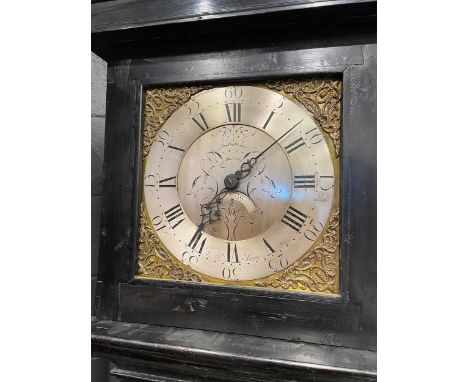 An ebonised longcase clock, 18th century, with 28.5cm square brass dial signed 'Will Snow', silvered centre and calendar aper