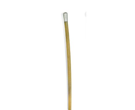 A silver mounted rhino horn riding crop, early 20th century, of typical tapering form and with silver mount to top65.5cm long