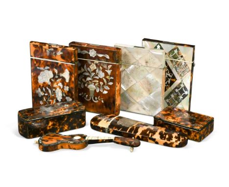 A collection of four Victorian tortoiseshell and mother-of-pearl card cases, each 10.5 x 8 x 1.5cm; together with a tortoises