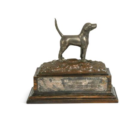 An electroplated presentation trophy, early 20th century, showing a study of a hound atop a formerly electroplated naturalist