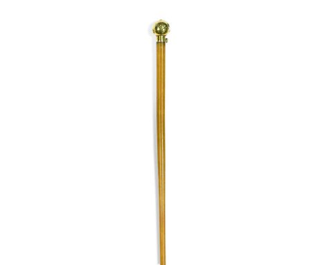 An 18ct gold handled rhino horn riding crop, early 19th century, of narrow tapering form, the gold finial mount hallmarked fo