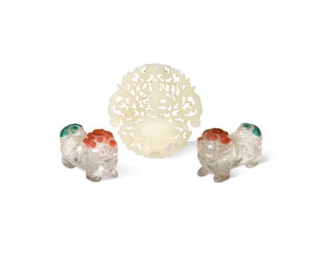 A Chinese carved mutton fat jade panel, late Qing Dynasty, pierced with a boy standing on a vase amongst foliage and a bat, 6