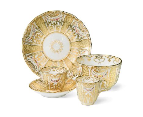 A Davenport porcelain tea and coffee service, 19th century, with a radial foliate and floral swag pattern, comprising 11 teac