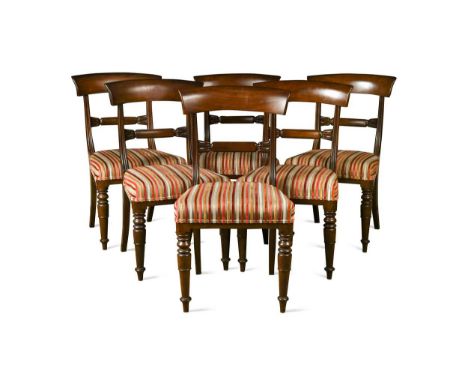 A set of eight Regency bar back dining chairs, the stuff over seats in a striped fabric on turned front legs87 x 47 x 53cmThe