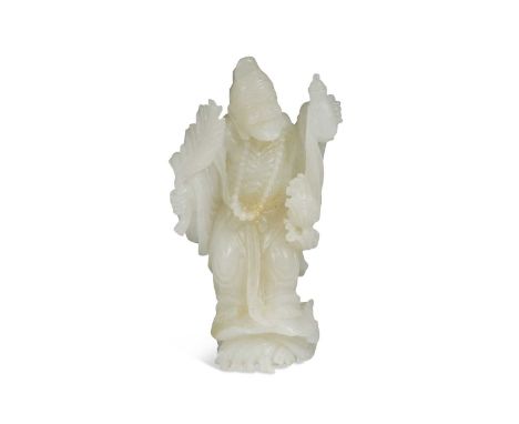 A Chinese mutton fat jade standing figure of a Luohan, 19th/20th century,  standing in robes and wearing a rosary, holding at