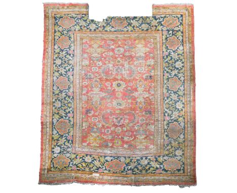 A Sultanabad carpet, possibly Ziegler Mahal, late 19th century, the floral field incorporating lotus flower motifs on a madde