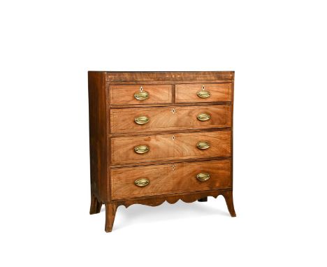 A Regency mahogany chest of drawers, the cross banded top above two short over three long drawers with inlay and bone escutch