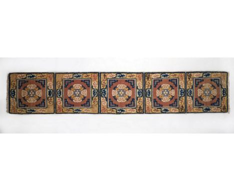 Himalayan Art A five seats woollen runner carpet Tibet, second half 19th century . . Cm 54,50 x 290,00. Provenance: Private C