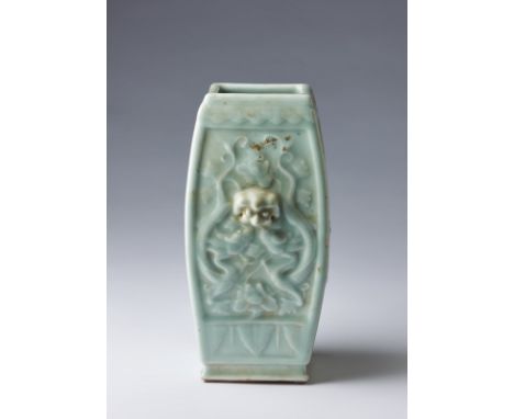 Chinese Art A moulded celadon glazed vase bearing a Qianlong seal mark at the baseChina, Qing dynasty, 19th century . . Cm 10