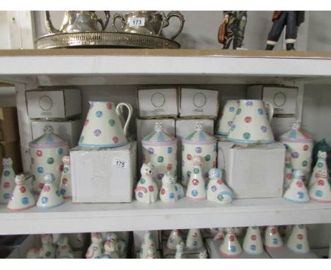 A shelf of 'Spotty Dotty Cat' cookie jars, jug, salt and pepper pots