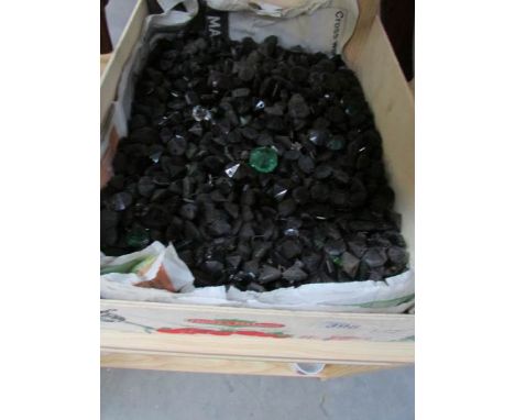 A box of black chandelier button droppers