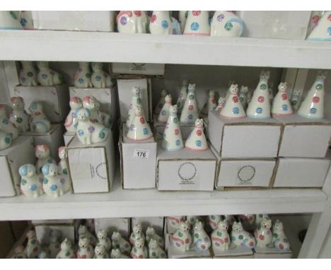 A shelf of 'Spotty Dotty Cat' salt and pepper pots
