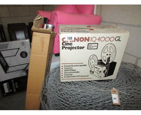 A Chinon IQ 4000 GL cine projector in original box and a projector screen