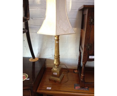 A GILDED PILLAR TABLE LAMP