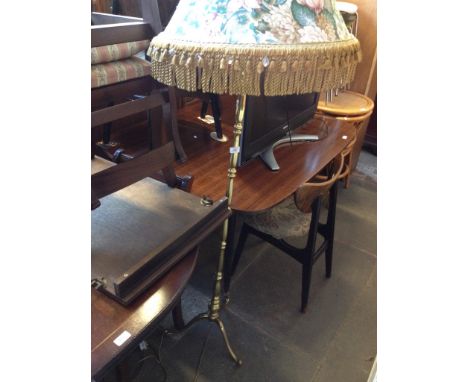 A BRASS STANDARD LAMP
