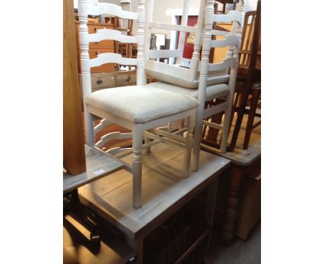 WHITE PAINTED EXTENDING OAK TABLE AND 4 LADDER BACK CHAIRS