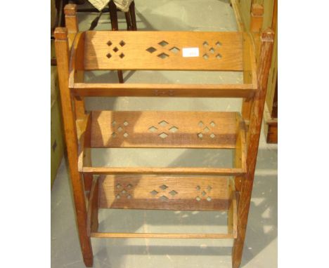 Oak carved Arts & Crafts three tiered book trough