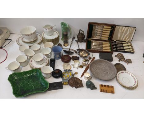 A mixed lot to include a Victorian papermache snuff box, boxed and loose cutlery, tea set, miniature Middle Eastern brass tea