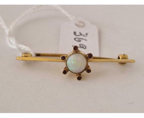 An opal and ruby bar brooch, 9ct, 1.9 g.