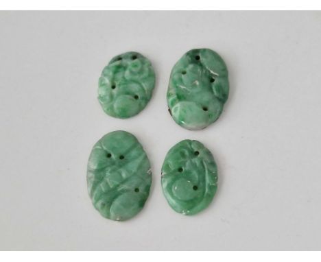 Four carved jade panels