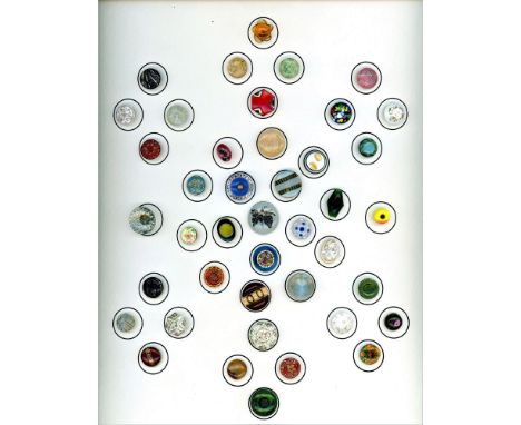 42 Small size 19th/20th century charmstring glass buttons.Here is a nice card of assorted glass buttons. Most are 19th centur