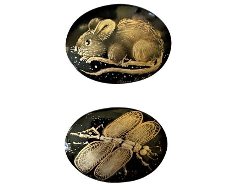 2 Large 20th century oval lacquer over wood animal buttons.Here are two cool large examples from the collection of Nikki Deal