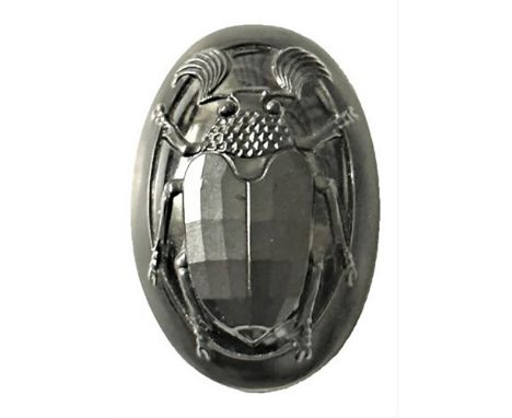 1 Large early 20th century bug button.This beetle bug button from the collection of Nikki Deal is molded in low relief and qu