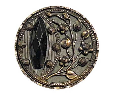 1 large 19th C. steel cup button with faceted black glass center.This black glass set in metal from the collection of the lat