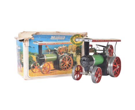 A vintage Mamod&nbsp;live steam model No. TE1A Steam Tractor Traction Engine. A green and red model of liquid fuel example wi