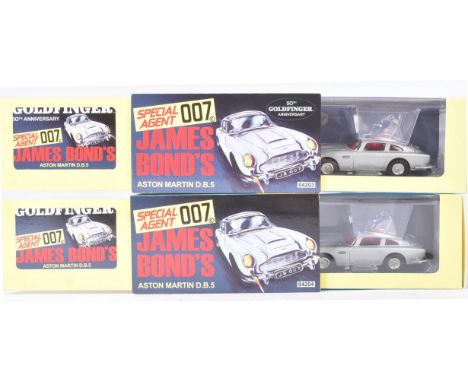 Two original Hornby made Corgi Toys boxed James Bond diecast models No. CC04203 Aston Martin DB5 in silver. The models with J