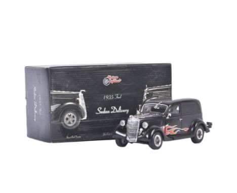 A vintage Unique Replicas 1/24 scale boxed diecast model No. 78404 1935 Ford Sedan Street Road version (flat black). Appearin