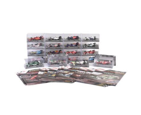 A collection of 1/43 scale boxed diecast model cars of Formula One interest with accompanying magazines. Examples to include;