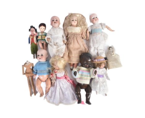 A collection of assorted early 20th Century bisque head and composition dolls to include German Heubach Koppelsdorf, Simon &a