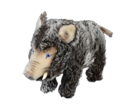 An original vintage German Steiff made soft toy teddy bear Wild Boar 'Dalle'. Complete with original plastic tusks and tail. 