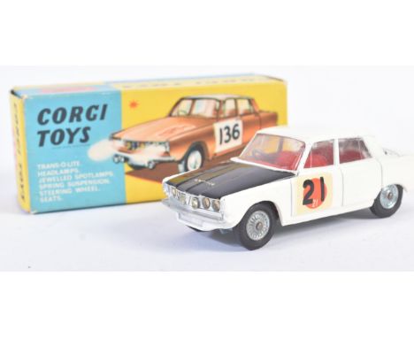 An original vintage Corgi Toys diecast model No. 322 Rover 2000 International Rally Finish. White body with black bonnet and 