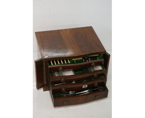 1930s Walker and Hall silver hallmarked canteen of cutlery housed within a mahogany four drawer canteen with ring pull handle