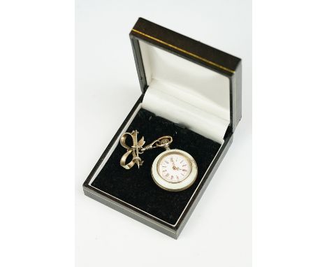 Enamelled silver fob watch with paste and seed pearls set verso, enamelled pearl set silver ribbon and bow brooch fitting wit