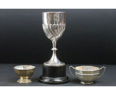 Silver presentation chalice engraved with a name and date each year from 1954-1968, gadrooning to the lower half, knopped ste